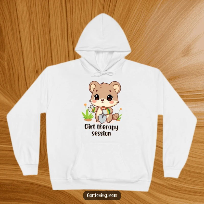 Funny Hoodie: An animal character wearing gardening gloves and holding a small shovel, prepared for garden work.