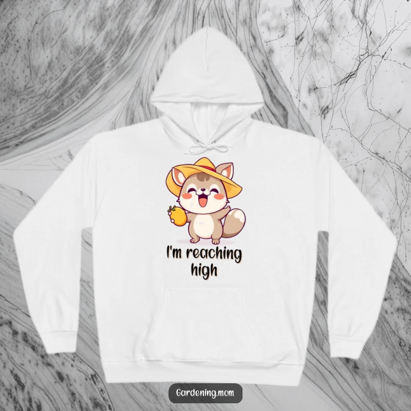 Funny hoodie depicting an excited animal in a sun hat reaching for fruit, offering warmth and a touch of summer fun.