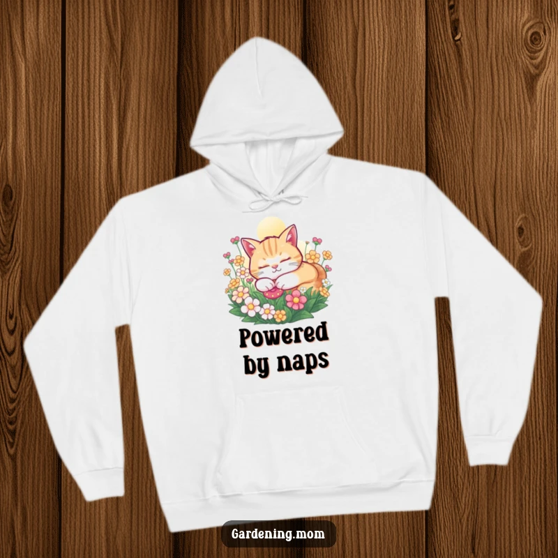 Funny Cat hoodie featuring a contented cat snoozing peacefully in a sunny flower bed, offering warmth and cute comfort.
